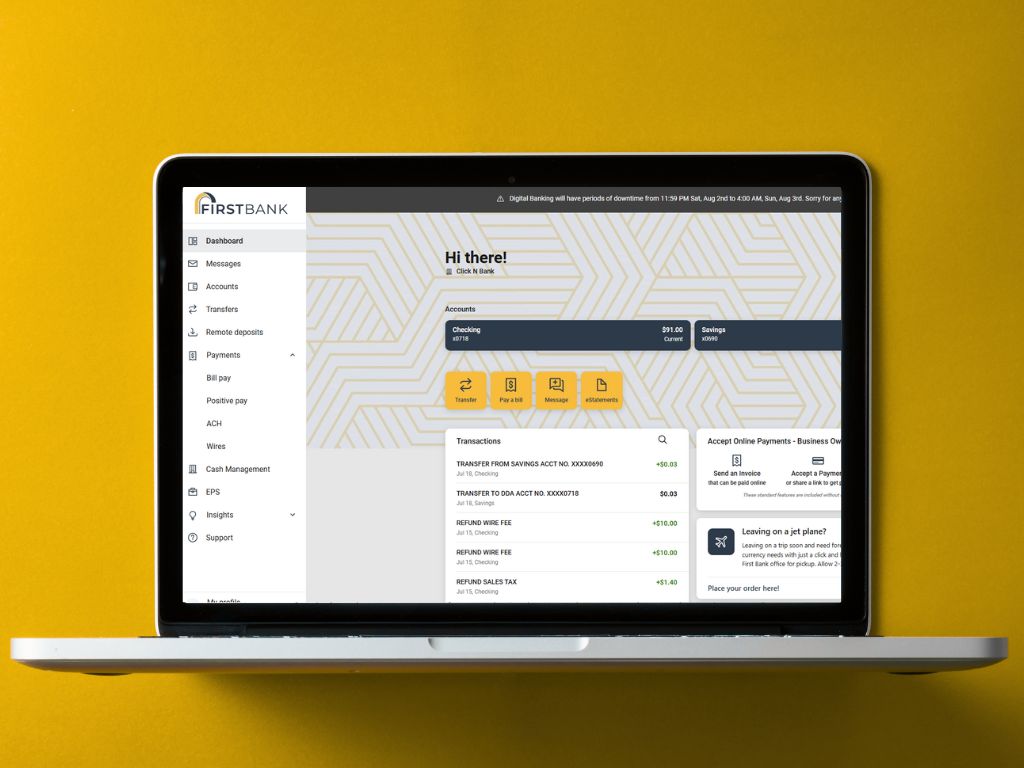 laptop_with_digital_banking_app_on_screen